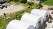 Companies seek cheaper alternatives to traditional halls. Container canopies and arched halls are gaining popularity