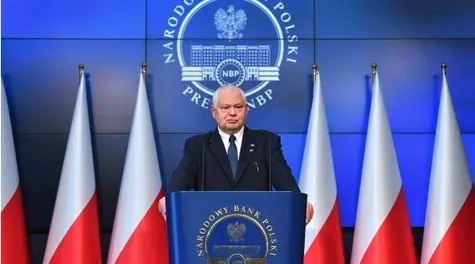 Polish central bank lowers rates despite earlier hawkish tone