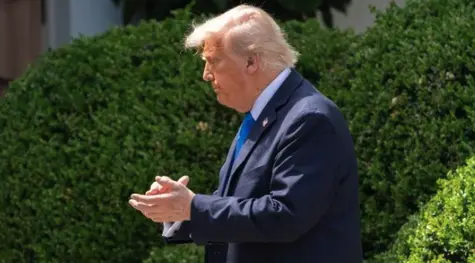 Dollar Slips as Tariff Risks Rise and Fed Turns Dovish